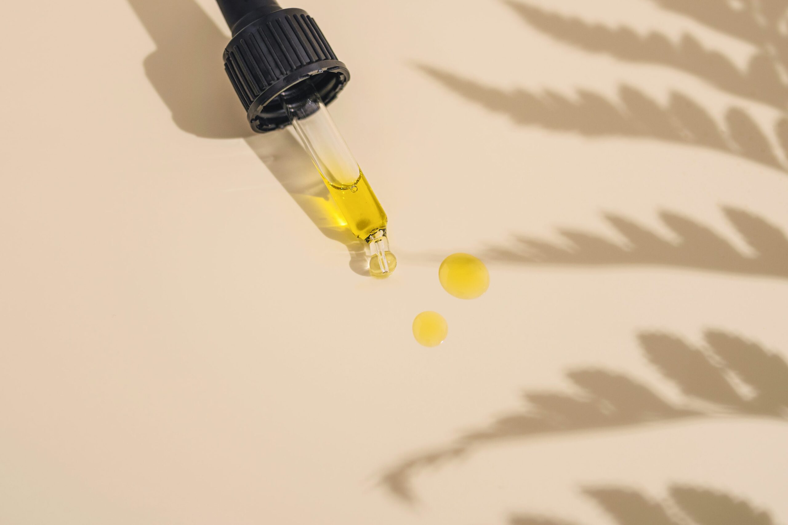 CBD oil tincture with dropper showing precise sublingual dosing