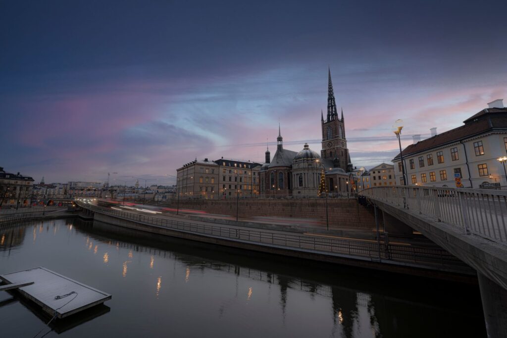 Stockholm Sweden skyline with church spire at sunset