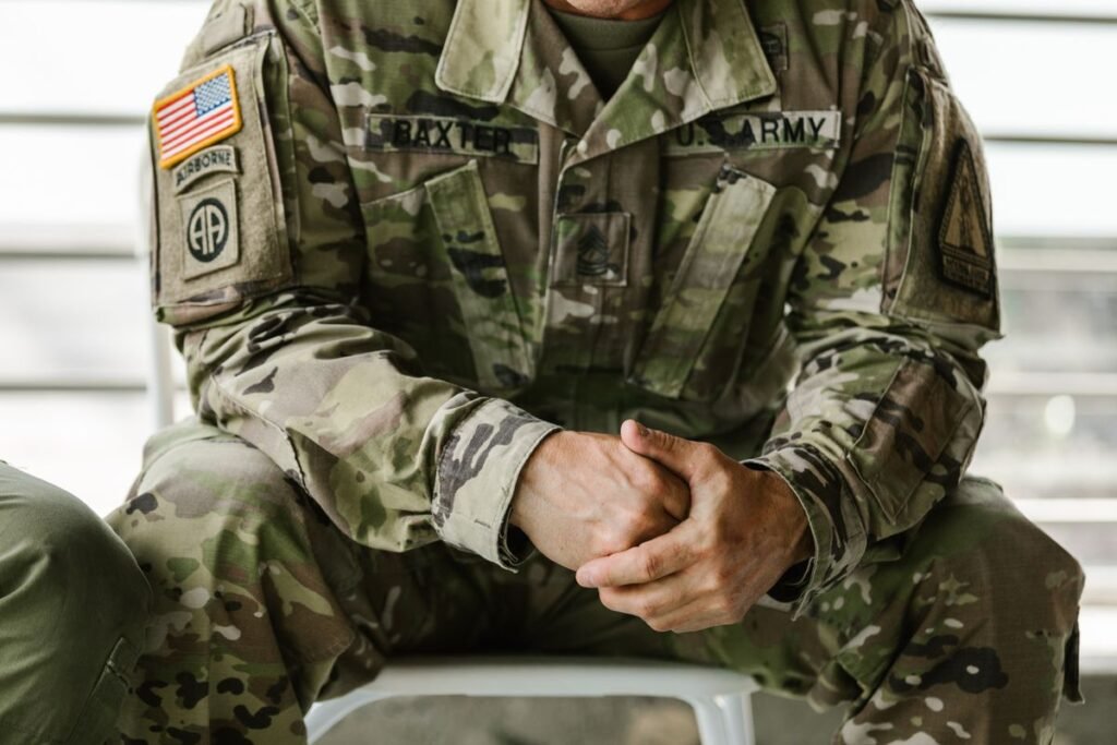 Close-up of a U.S. Army soldier in uniform with name tape and unit patches