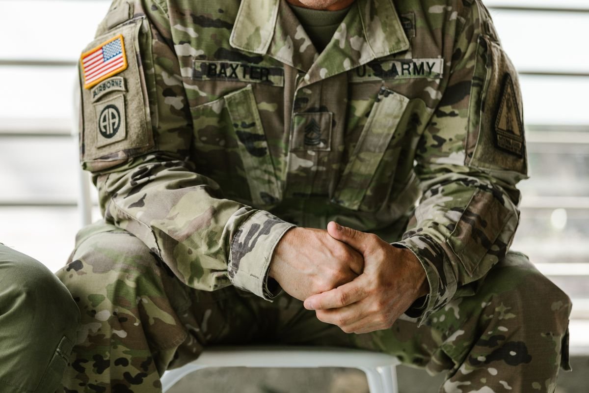 Close-up of a U.S. Army soldier in uniform with name tape and unit patches